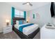 Comfortable bedroom offering a cozy bed, stylish furnishings, and a relaxing atmosphere at 2771 Oxymoron Way, Kissimmee, FL 34746