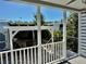 View of backyard with outdoor grill and bar under pergola, perfect for outdoor gatherings and enjoyment at 3067 Ne 102Nd Avenue Rd, Silver Springs, FL 34488