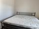 Bedroom featuring a bed, carpeted floors, neutral walls, and natural light at 3067 Ne 102Nd Avenue Rd, Silver Springs, FL 34488