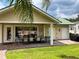 Exterior view of the community clubhouse, showcasing amenities for residents with an outdoor patio at 3067 Ne 102Nd Avenue Rd, Silver Springs, FL 34488