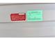 Close-up view of installation and manufacturing labels, ensuring quality and compliance standards at 3067 Ne 102Nd Avenue Rd, Silver Springs, FL 34488