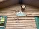 Sign for laundry facilities on log-paneled building at 3067 Ne 102Nd Avenue Rd, Silver Springs, FL 34488