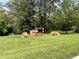The outdoor space has fun Halloween decorations, including hay bales, pumpkins and a small snack bar at 3067 Ne 102Nd Avenue Rd, Silver Springs, FL 34488