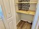 Walk-in pantry with shelving and wood countertop space at 3067 Ne 102Nd Avenue Rd, Silver Springs, FL 34488