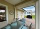 Outdoor patio includes seating for dining, a grill, and a water fountain perfect for entertaining at 3067 Ne 102Nd Avenue Rd, Silver Springs, FL 34488