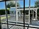 Covered patio includes a pergola and a storage shed, with an outdoor seating area at 3067 Ne 102Nd Avenue Rd, Silver Springs, FL 34488