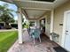 Relax on the outdoor patio with brick flooring, a ceiling fan, and plenty of room for outdoor dining at 3067 Ne 102Nd Avenue Rd, Silver Springs, FL 34488
