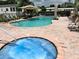 Community pool and hot tub offer a great place to relax in a safe and clean environment at 3067 Ne 102Nd Avenue Rd, Silver Springs, FL 34488