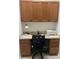 Cozy home office with built-in desk and cabinets, ideal for remote work at 3111 Wentworth Ln, Kissimmee, FL 34741