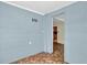 A bonus room with blue block walls and access to an adjoining room at 320 Granada Dr, Winter Park, FL 32789