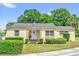 Charming single-story home with well-maintained landscaping and a decorative entryway at 320 Granada Dr, Winter Park, FL 32789