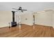 Spacious living room with hardwood floors and a cozy fireplace at 320 Granada Dr, Winter Park, FL 32789