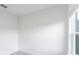 Bare bedroom with neutral walls, tiled floors, and ample natural light at 3389 Sw 126Th Lane Rd, Ocala, FL 34473