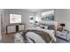 Bright bedroom with stylish furniture, large windows, and modern decor at 3389 Sw 126Th Lane Rd, Ocala, FL 34473