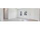 Bright living room with neutral walls, tiled floors, and ample natural light at 3389 Sw 126Th Lane Rd, Ocala, FL 34473