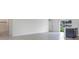 Open concept floor plan with kitchen island and bar seating open to living area at 3389 Sw 126Th Lane Rd, Ocala, FL 34473