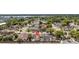 Real estate aerial view showcasing the home's location in a quiet, established residential neighborhood with mature trees at 357 Kantor Blvd, Casselberry, FL 32707