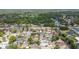Aerial neighborhood view featuring diverse residential architecture, green spaces, and serene landscaping, enhancing the community's charm at 357 Kantor Blvd, Casselberry, FL 32707