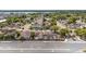 Charming neighborhood aerial view with tree-lined streets, well-maintained homes, and a glimpse of the tranquil lake at 357 Kantor Blvd, Casselberry, FL 32707