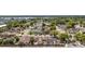 Real estate aerial view showcasing the home's location in a quiet, established residential neighborhood with mature trees at 357 Kantor Blvd, Casselberry, FL 32707