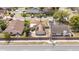 Quaint residential exterior showcasing solar panels and a brick fence in a sunny, serene neighborhood setting at 357 Kantor Blvd, Casselberry, FL 32707