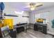Bright, stylish office space with creative lighting, decor, brick accent wall and window at 357 Kantor Blvd, Casselberry, FL 32707