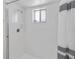 Shower with a window and striped shower curtain at 357 Kantor Blvd, Casselberry, FL 32707