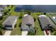 Beautiful aerial view of the home's roof, landscaping, and surrounding neighborhood at 4060 Longworth Loop, Kissimmee, FL 34744