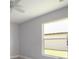 Bedroom with a large window with a view of the backyard at 4060 Longworth Loop, Kissimmee, FL 34744