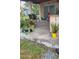 Covered porch provides an inviting outdoor space with a variety of potted plants at 4619 Salvia Dr, Orlando, FL 32839