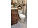Bathroom includes granite counters, modern fixtures, and tiled shower and flooring at 4619 Salvia Dr, Orlando, FL 32839