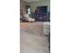 Comfortable living room features a brick accent wall and neutral tile flooring at 4619 Salvia Dr, Orlando, FL 32839