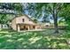Spacious backyard with a covered patio, perfect for outdoor entertaining and relaxation at 466 Drexel Ridge Cir, Ocoee, FL 34761