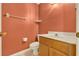 Powder room featuring tile floors and a light wood vanity at 466 Drexel Ridge Cir, Ocoee, FL 34761