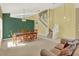 View of the bright dining room and staircase at 466 Drexel Ridge Cir, Ocoee, FL 34761