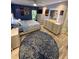 Stylish bedroom with a blue accent wall, modern furniture, and decorative Wonder Personal artwork at 4800 S Semoran Blvd # 101, Orlando, FL 32822