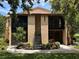 Inviting exterior with well-maintained landscaping and access stairs to the upper level units at 4800 S Semoran Blvd # 101, Orlando, FL 32822