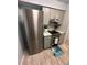 Well-lit kitchen featuring stainless steel appliances, light gray cabinetry, and a modern electric cooktop range at 4800 S Semoran Blvd # 101, Orlando, FL 32822