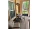 Cozy screened patio with neutral furniture, an outside view, and natural light at 4800 S Semoran Blvd # 101, Orlando, FL 32822