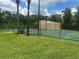 Exterior view of private tennis courts and clubhouse in a beautiful community at 4800 S Semoran Blvd # 101, Orlando, FL 32822