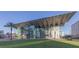 Exterior Daytime view of the Amway Center of Orlando, Florida showing its innovative architecture and welcoming green spaces at 52 Overleaf Ln, Orlando, FL 32839