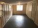 Versatile bonus room with durable flooring, natural light, and multiple access doors at 530 Ruffel St, Maitland, FL 32751