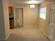 Cozy dining area featuring neutral walls, modern light fixture, and an access door at 530 Ruffel St, Maitland, FL 32751