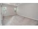 Bright bedroom with a ceiling fan, natural light, and neutral carpet, creating a serene and inviting atmosphere at 543 Auburn Hill Blvd, Auburndale, FL 33823
