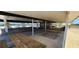 Spacious covered picnic area with wooden tables, perfect for outdoor gatherings and relaxation at 6273 Toronja Dr, Indian Lake Estates, FL 33855