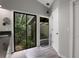 Unique bathroom featuring a private outdoor atrium with lush foliage at 700 Bear Shadow Ct, Longwood, FL 32779