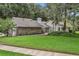 Landscaped front yard with a stone accent wall adding character to this attractive single-Gathering home at 700 Bear Shadow Ct, Longwood, FL 32779
