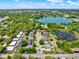 A high altitude aerial view shows the layout of this peaceful community close to the lake at 732 Wildmere Village Cv, Longwood, FL 32750