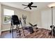 Bright bedroom equipped with workout equipment and a window for natural lighting at 732 Wildmere Village Cv, Longwood, FL 32750