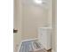 Cozy laundry room featuring a washer, dryer, and a door on the left-hand side at 732 Wildmere Village Cv, Longwood, FL 32750